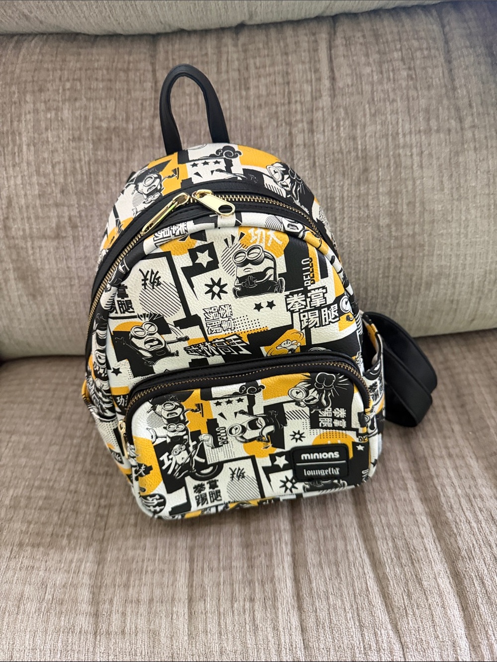 Loungefly minion Gru Karate graphic black, yellow, and white backpack